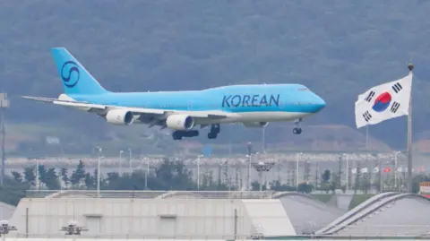 Reuters A chartered plane transporting South Korean workers who were detained in a huge immigration raid last week at the site of a U.S. car battery project involving Hyundai Motor and LG Energy Solution in the U.S. state of Georgia, arrives at the Incheon International Airport in Incheon, South Korea, September 12, 2025.