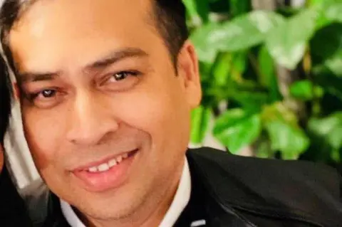 Jannatul Mauwa Raish Ahmed, a man with dark hair smiling at the camera