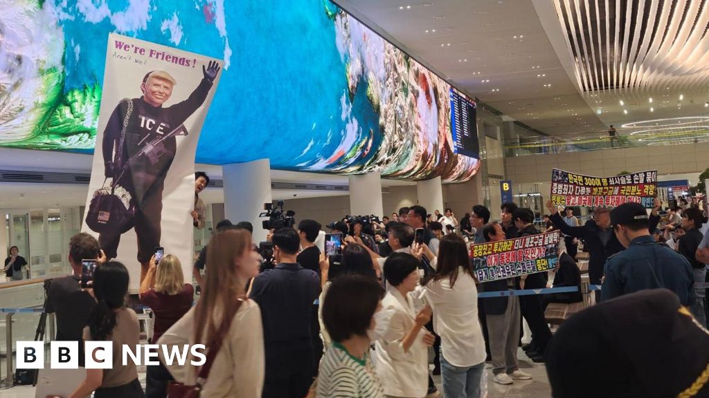 South Korea workers detained in US raid arrive home