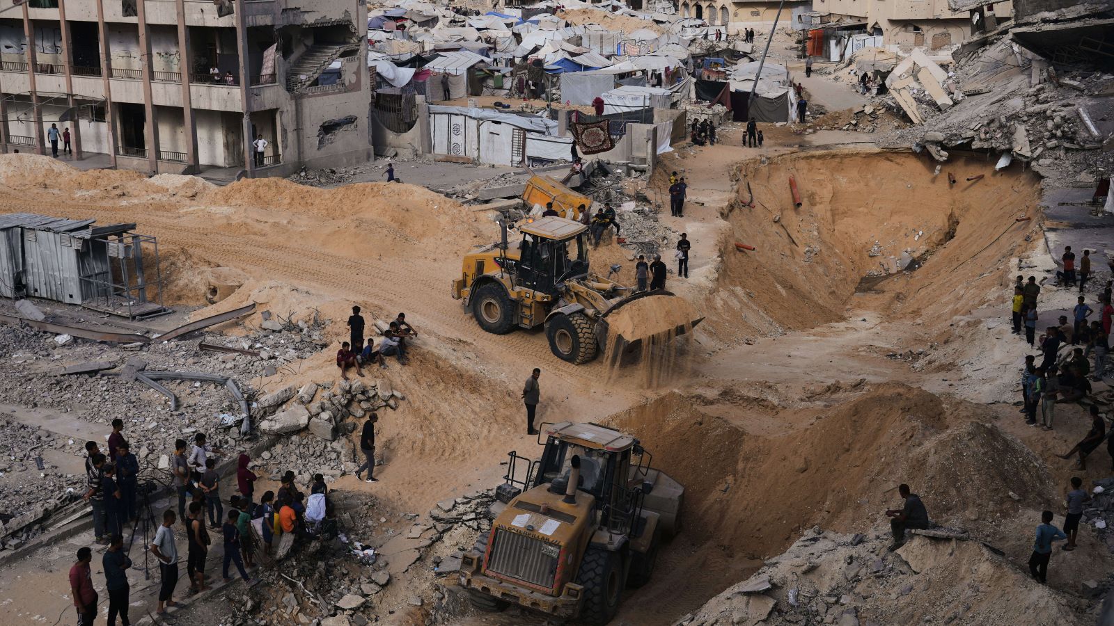 Israel says Hamas hands over ‘2 coffins of deceased hostages’ from Gaza | World News