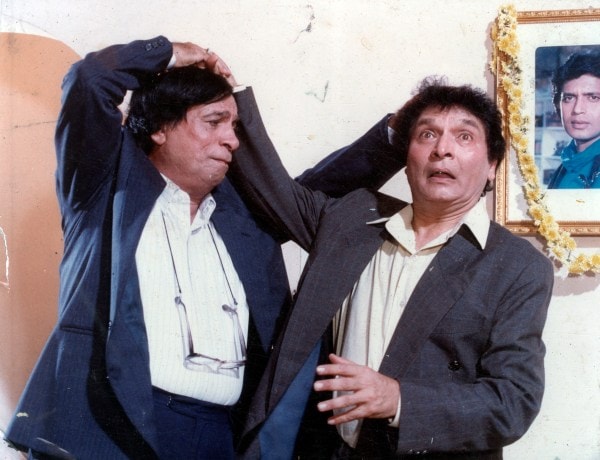 Film star Kader Khan and Asrani in film DIYA AUR TOOFAN. Express archive photo *** Local Caption *** Film star Kader Khan and Asrani in film DIYA AUR TOOFAN. express archive photo