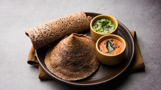 Instead of refined flours and grains, choose whole grains like millets to make your favourite Indian dishes, such as dosa.(Shutterstock)