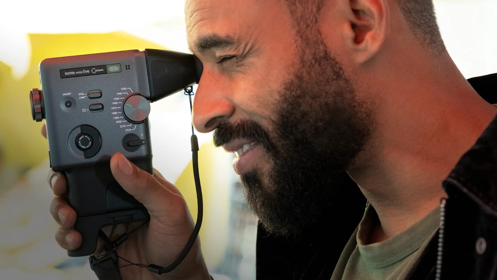 Fujifilm instax mini Evo Cinema is a hybrid instant camera inspired by the 1965 FUJICA Single-8 movie camera.