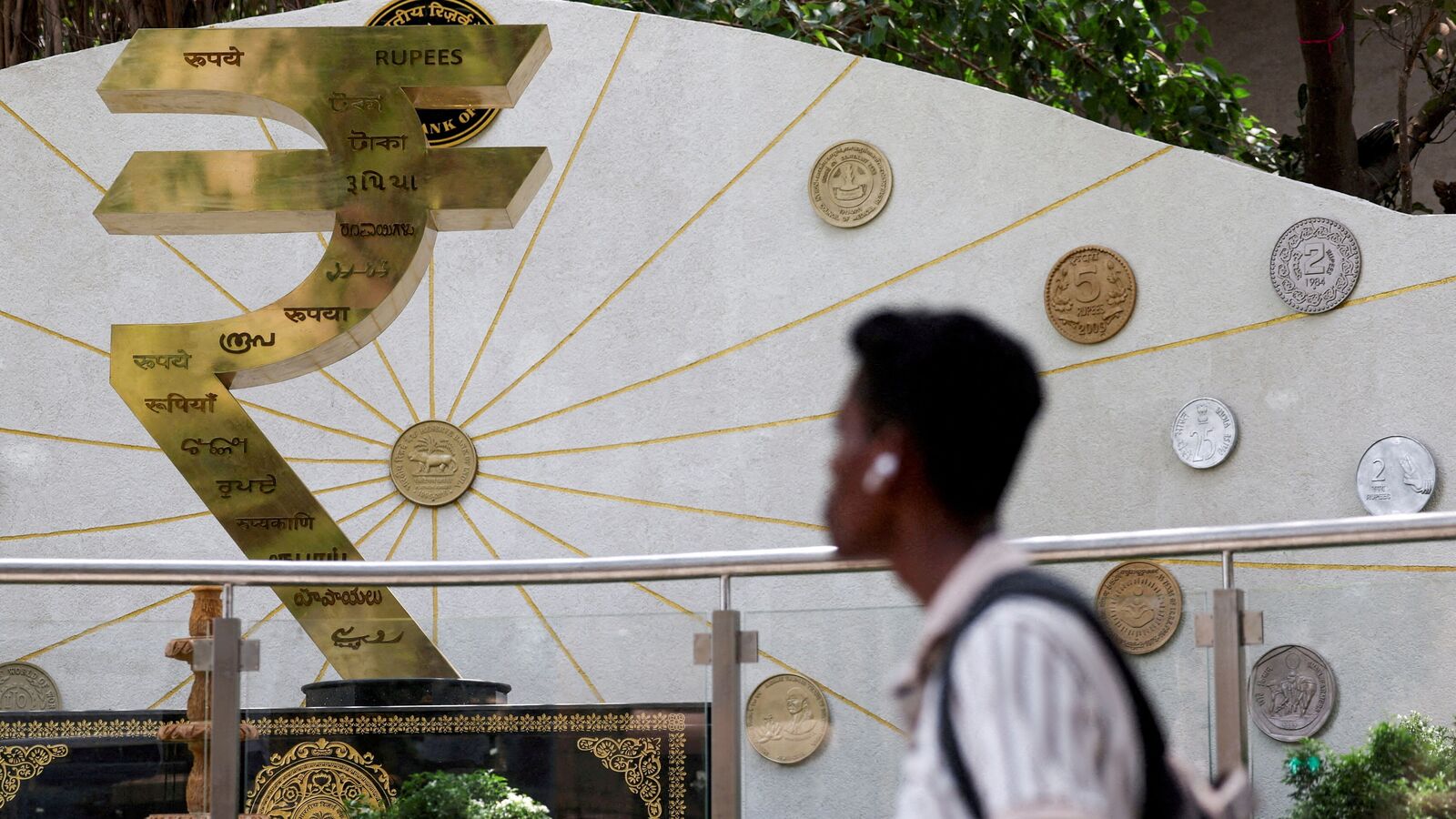 Rupee slips to record low near 92.00 against US dollar. Where is INR headed now?